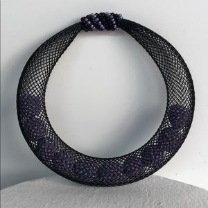 Bracelet, Black/purple woven and beaded bracelet.